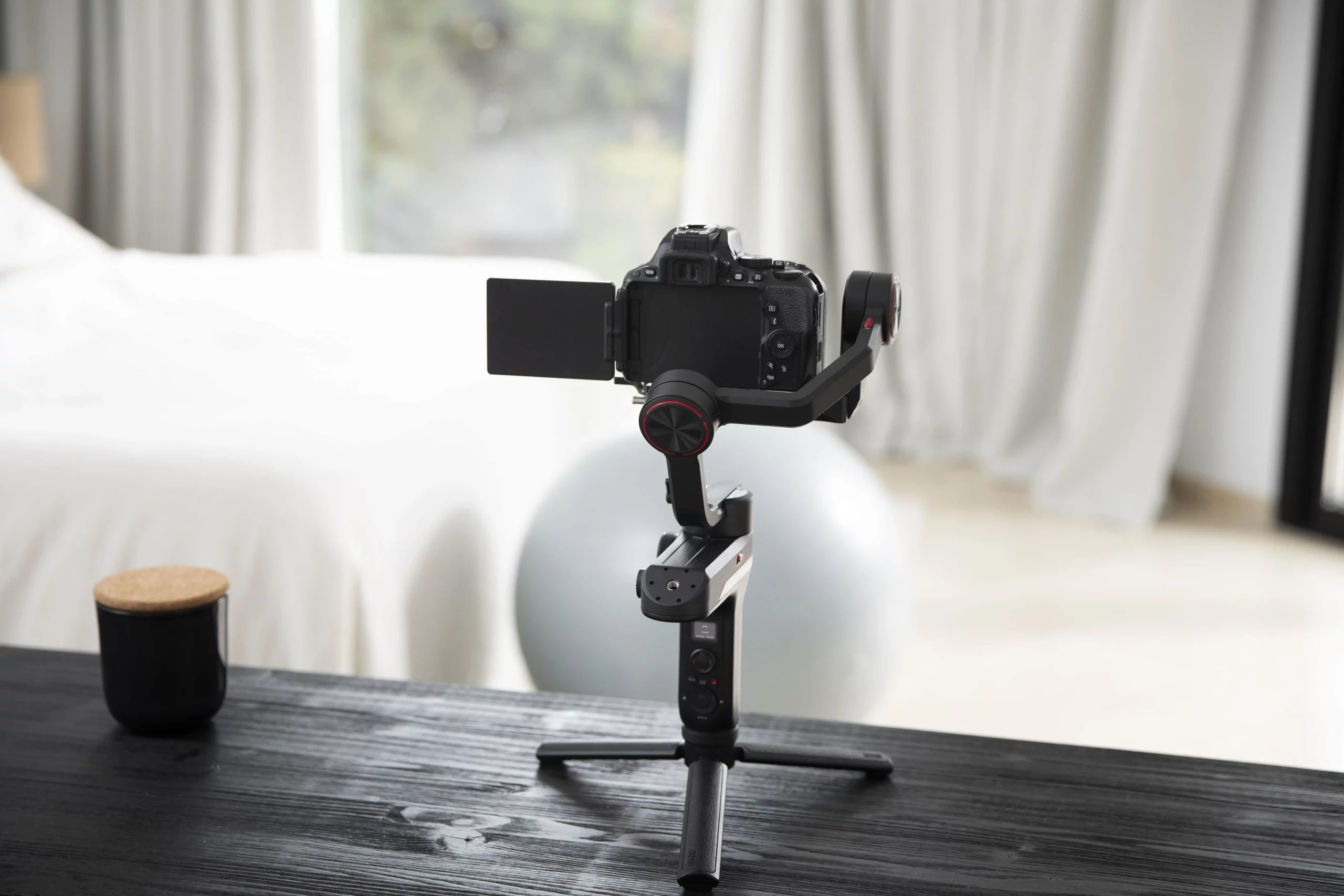 A gimbal on table set to shoot